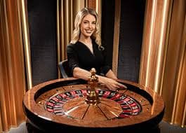 Gem Saviour slot game interface showing gem symbols, pay table, and spin controls